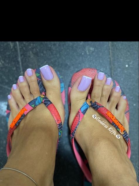 They both use different colors of blue toe nails. . Kiffa feet